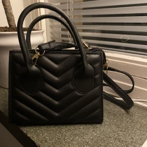 Väska - En fin väska som inte kommer till användning. 