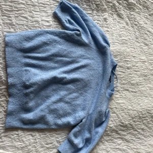 Stickad kortärmad tröja  - Använda Max två gånger