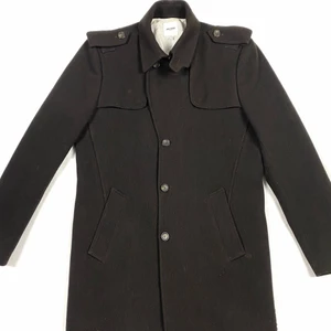 Moschino Brown Wool Coat - 80% wool 20% nylon.  Length 92 cm Width 53 cm Shoulder to shoulder 48 cm