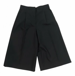 Sandro black wool-mix cullotes  - Knee-length cullotes in black wool-mix from the French high-end brand Sandro. Size is 38. Only worn once, in perfect condition. No signs of wear. Work perfect with knee-high boots! 