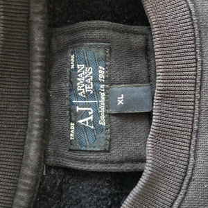 Armani Jeans Vintage sweater - It’s an XL but fits me as a medium. A bit wider than usual on waist but not baggy at all.