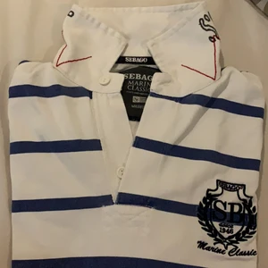 Sebago långärmad piké  - finns även massa pikéer både lång och kortärmade och några stickade tröjor i olika märken storlek L/XL 