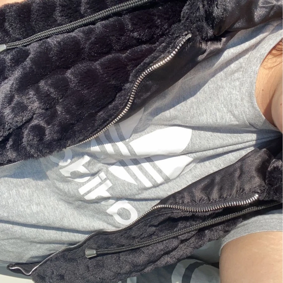 päls väst med luva 