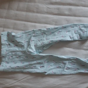 Byxor/tights med flamingo på från Mywear Baby - Aldrig använt, kvalité bra, bara lite skrynklig. Resårband töjbar och bra. 