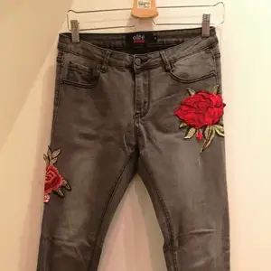 gray jeans with beautiful roses, very comfortable.