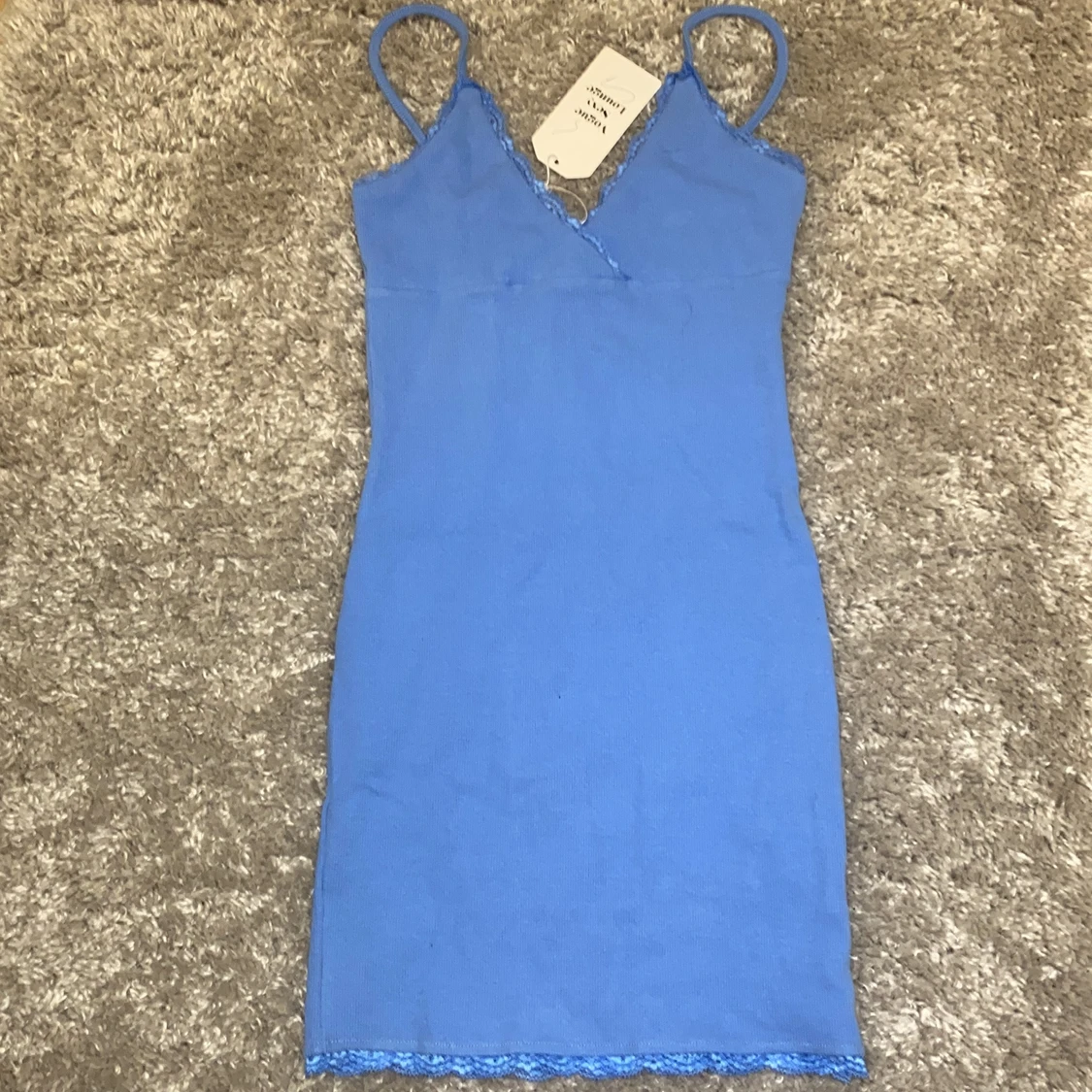 En fin baby blå klänning strl 