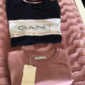 En basic Gant t-shirt storlek 164 cm och en lila rosa t-shirt storlek S