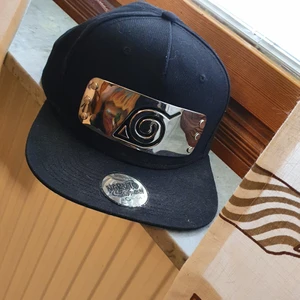 NARUTO KEPS - Naurot keps, lite dammig men i bra skick. Säljer detta då jag bara har använt den 1 gång.