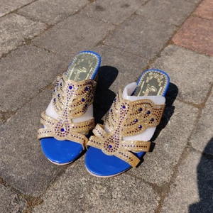 Finsko - Guldig klacksko oanvända