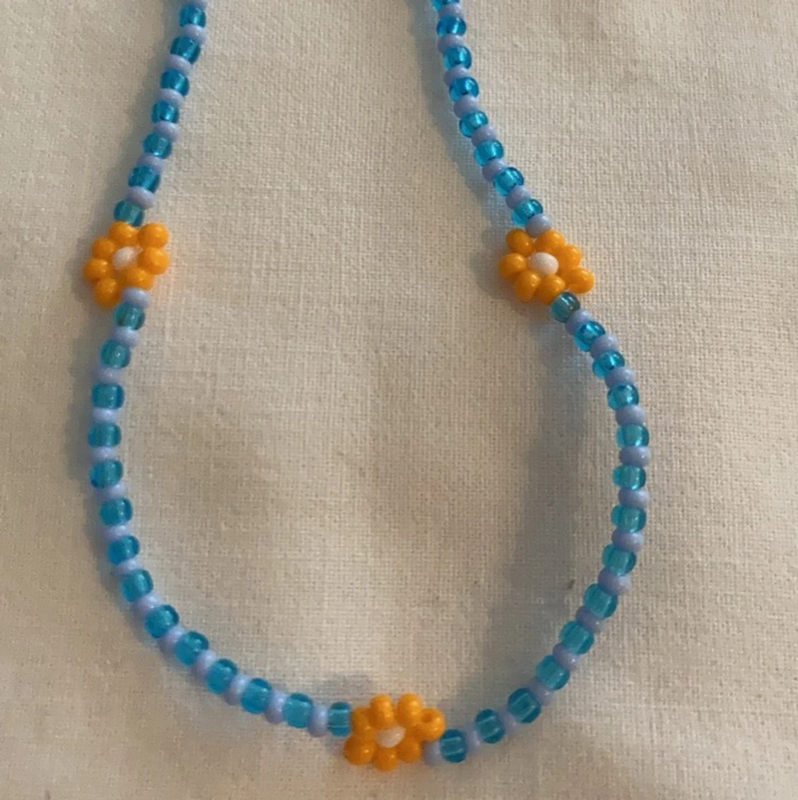 Halsband blommor - 90