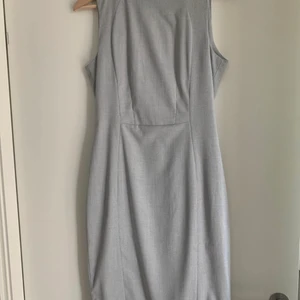 Formal dress - Worn only once,it is now to small for me.