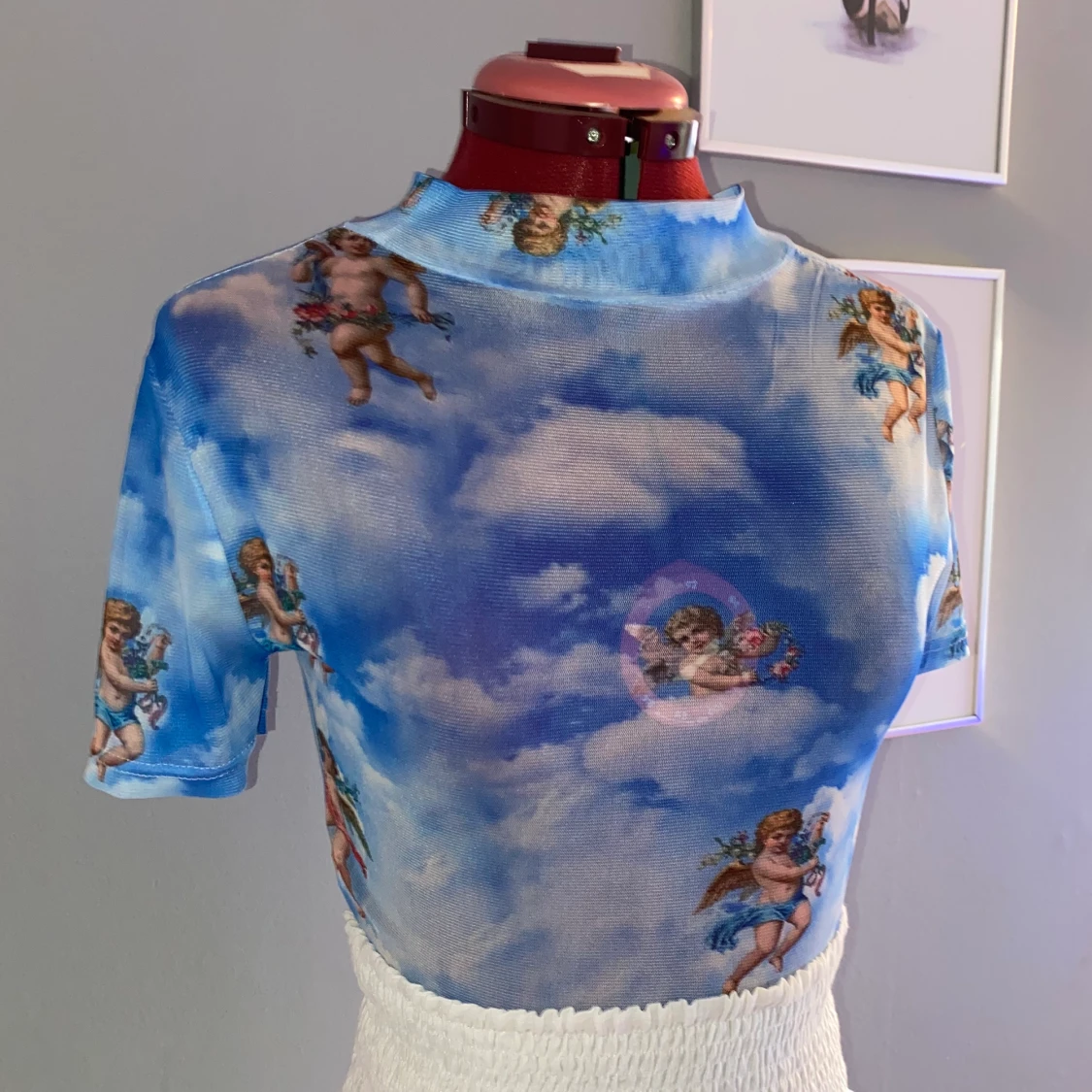 Topp med änglar på