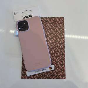 Säljer ett oanvänt mobilskal till Iphone 13 från HoldIt. Den är gjord av silikon och är rosa. Säljer för 113kr i klusive frakt. 