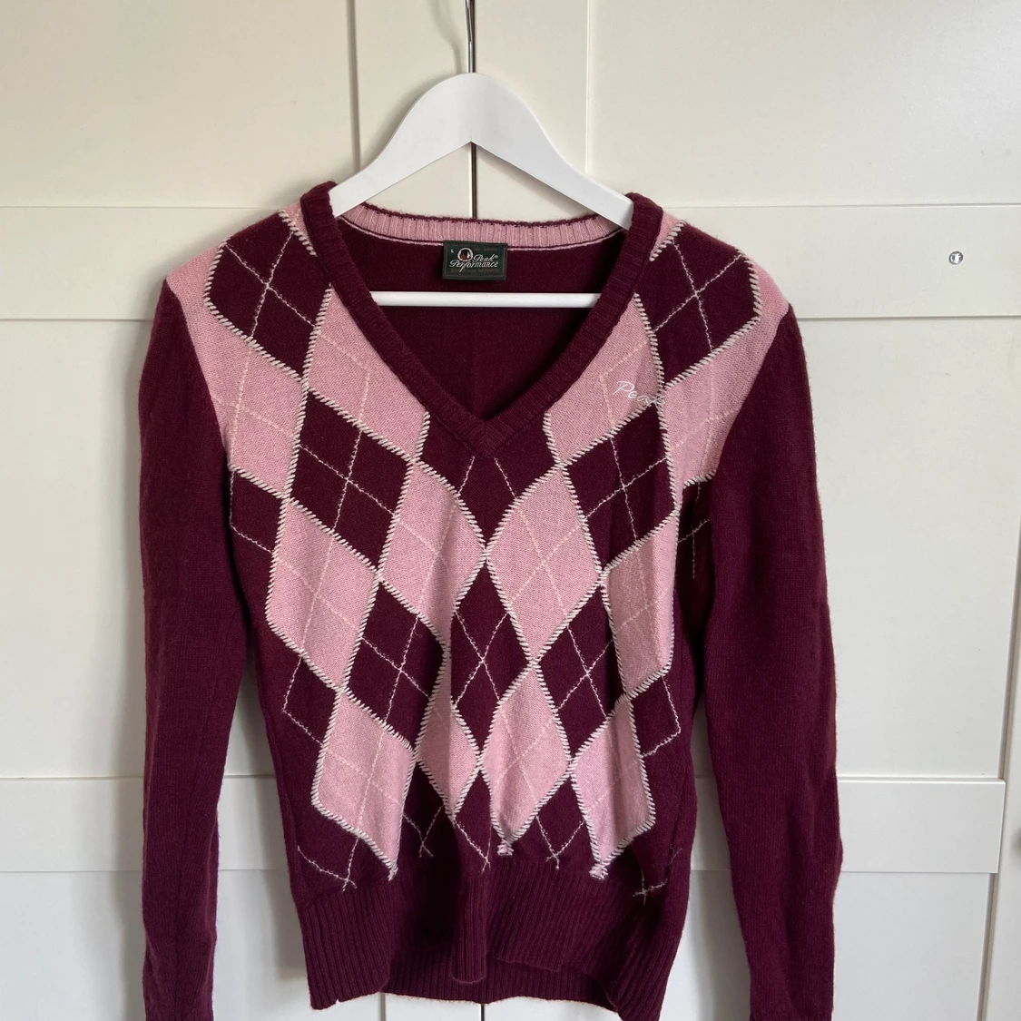 Stickad Peakperformance tröja  - 90