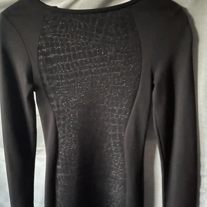Black scale dress - Black silhouette scale dress. In a size EU 34. In good condition. 