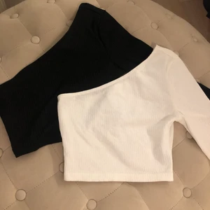 Toppar - Den vita är använd 1 gång och den svarta är oanvänd. Original priset för båda var 90kr men säljer dom för 75kr. Frakt betalas av köparen.