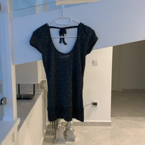 Svart glittrig topp - En svartglittrig topp