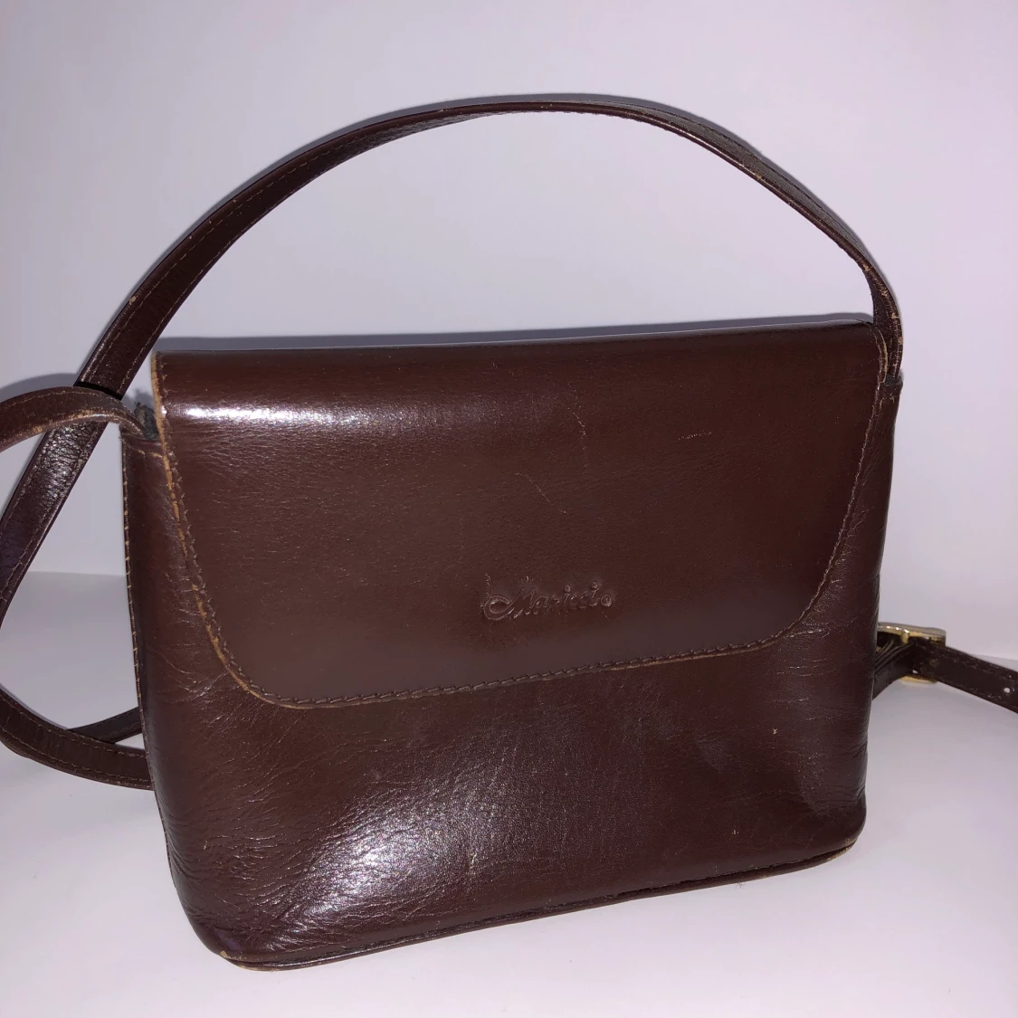 Brun axelremsväska från maricci