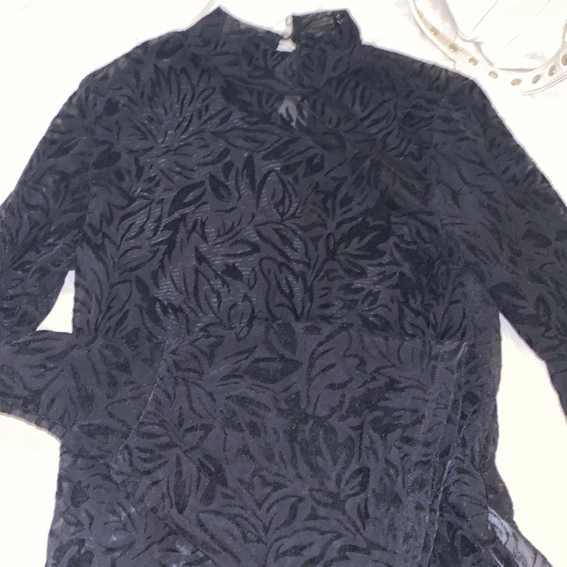 Svart genomskinlig topp