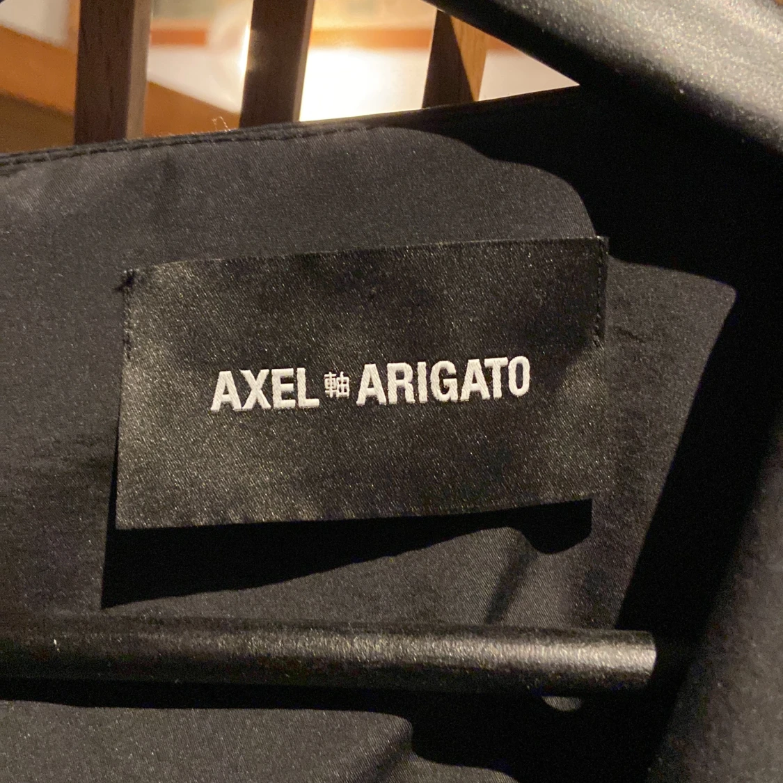 Axel Arigato väst  - 91