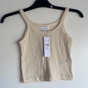 Beige linne - Ribbat beige linne från Topshop, säljer då det var lite för litet. Modellen på sista bär samma strl (36)