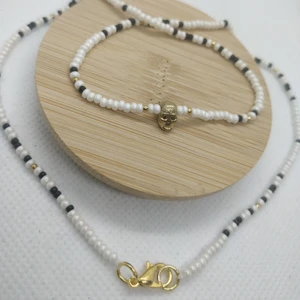 Halsband med gulddödskalle - Halsband med gulddödskalle 🔗
