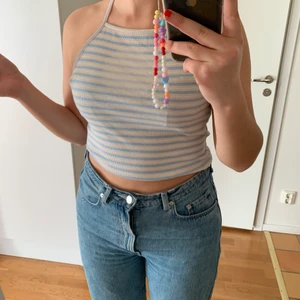 Randigt linne - Randigt linne från bikbok med kors i ryggen (se sista bild). Nyskick 