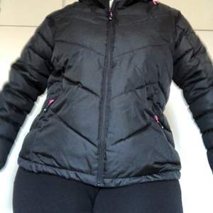 Winter jacket. Used few times only. Xxl. Black with some touches of pink on the zippers. 