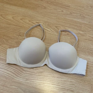 Beige balconette BH Lindex - Beige balconette BH med bygel och avtagbara axelband