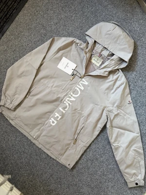 Moncler gray windbreaker - Size M, true to size. Just like new, very comfortable and high quality.