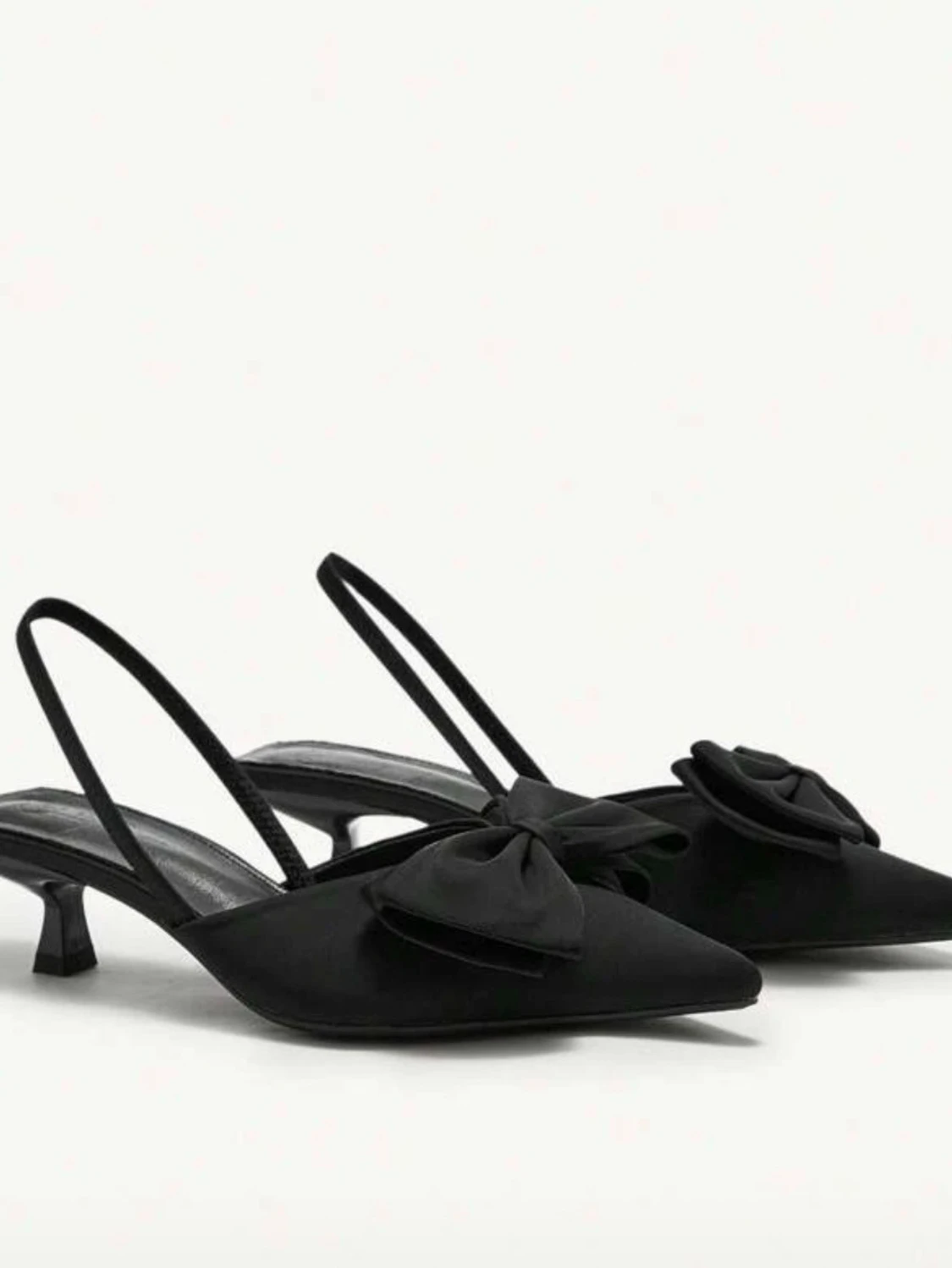 Svarta pumps med rosett - 1