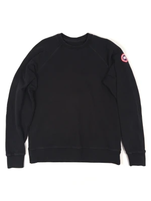 Canada Goose Sweatshirt - Information: Canada Goose Black Sweatshirt, 100% cotton, Rib-knit collar, cuffs, and hem, Patch on the left sleeve, Size M  Condition: The sweatshirt has been gently used and is in very good condition. Pit to Pit: 57.5 cm / 22.6 Inches Chest: 115 cm / 45.3 Inches Length: 71.5 cm / 28.1 Inches