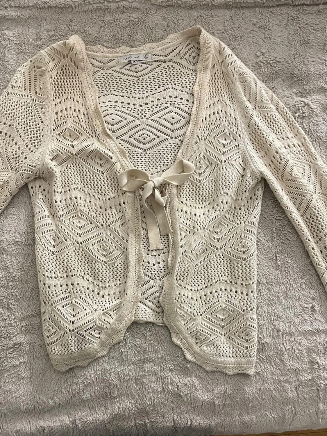 Söt  virkad kofta med knytband - 1