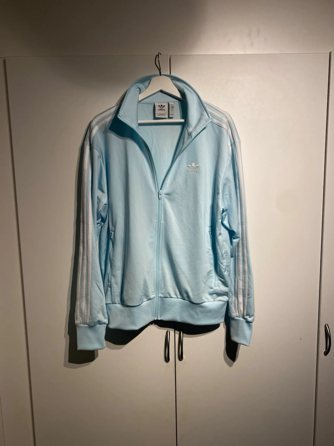 Ljusblå Adidas track jacket