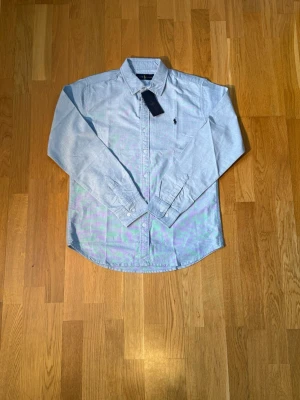 Ralph lauren skjorta  - Ralph lauren skjorta | S | ljusblå | helt ny med tagg | bara att höra av sig om man undrar nåt |