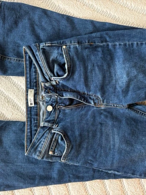 Bootcut jeans - Mid waist
