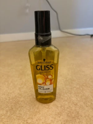 Hårolja gliss - Använd fåtal gånger.