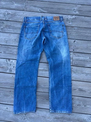 Vintage Tommy Hilfiger Jeans  - Vintage straight leg jeans.  Brand: Tommy Hilfiger  Tagged size: 34/32  Waist (flat): 43,5cm Length: 103cm Leg opening: 21cm  Follow my profile for 10% off your purchase!  More jeans available on my profile.  Nr: 52 