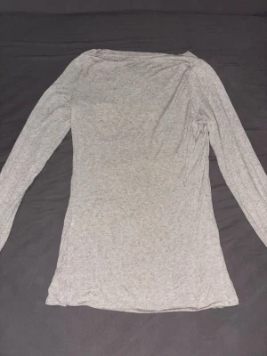 Ljusrosa långärmad topp Intimissimi - Ljusrosa långärmad topp från Intimissimi i mjukt och stretchig material. Perfekt att matcha med jeans eller kjol för en clean look.💕