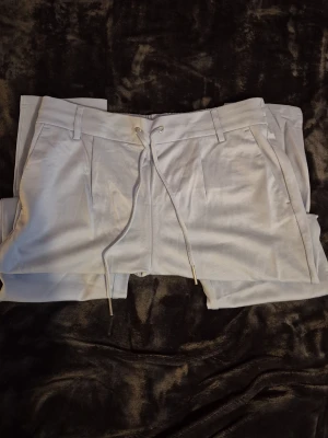 Ljusblåa mjuka "kostymbyxor" - Ljusblåa mjuka "kostymbyxor". Storlek L