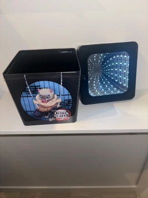 Demon Slayer Infinity Castle Popcorn Bucket (limited Edition) - Bought it from my local cinema when the infinity castle was streaming. selling because I don’t have any space for it in my shelf! ❣️ Prices are negotiable 