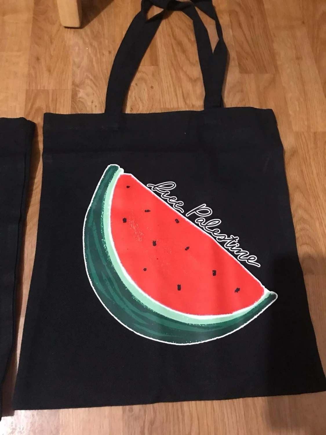 Svart tygkasse med vattenmelontryck