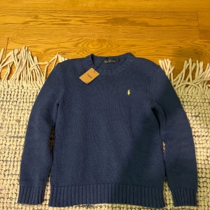 Ralph Lauren knit - Bought it from Sellpy. Sellpy sells only authentic items. The knit is sized men S. In good condition, no stains or holes.