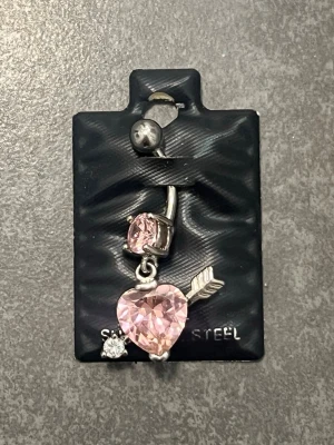 Rosa hjärtformad navelpiercing - Använd en gång