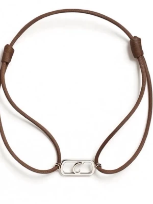 Cirento - Snyggt cirento armband i brunt läder med en stilren silverfärgad metallberlock framtill. Justerbar längd tack vare knutarna på sidorna. Perfekt accessoar för en trendig och minimalistisk look.