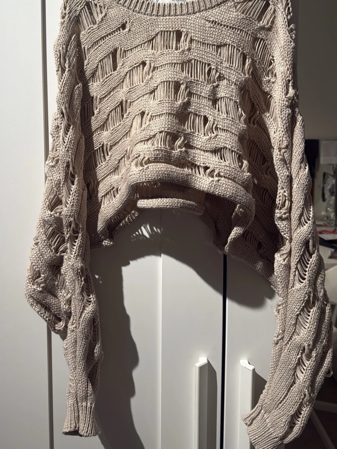 Beige croppad stickad tröja