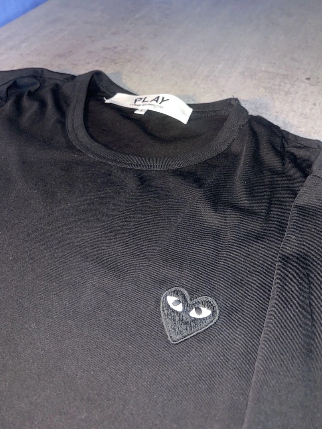 Svart långärmad topp från Comme des Garçons