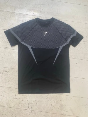 Svart/Grå Gymshark Onyx 5.0 - Helt ny träningströja från Gymshark i storlek L. Rep.