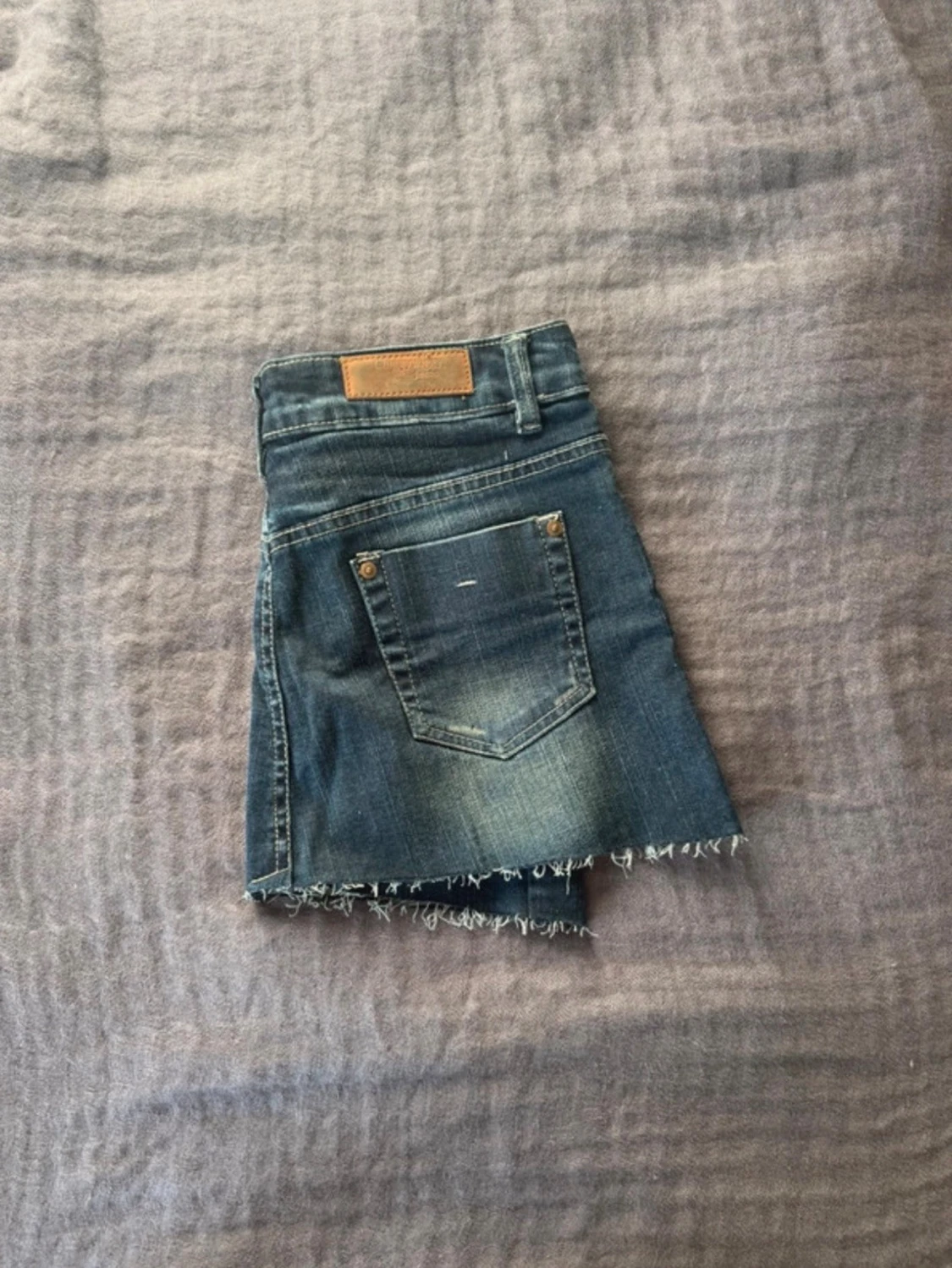 Blå lågmidjad jeanskjol  - 1