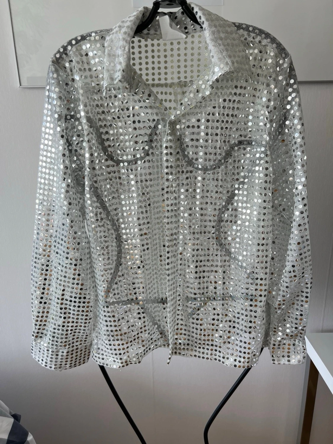 Glittrig discotröja i silver